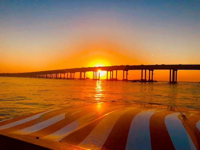 Sunset Dolphin Watching Cruise in Destin Harbor