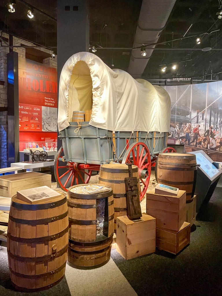 Exhibit with Covered Wagon at the Museum of Westward Expansion at the base of the Gateway Arch in St Louis