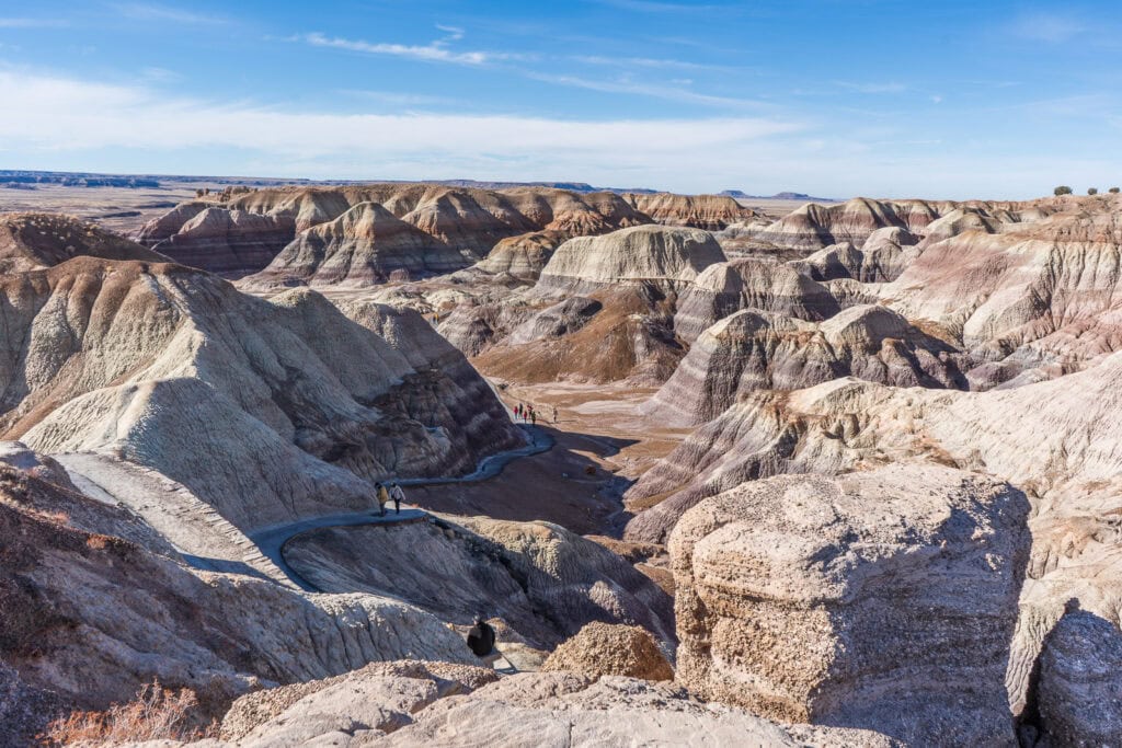 Blue Mesa area in Petrified Forest - Looks like badlands with stripes of colors, steep paved trail goes through the landscape
