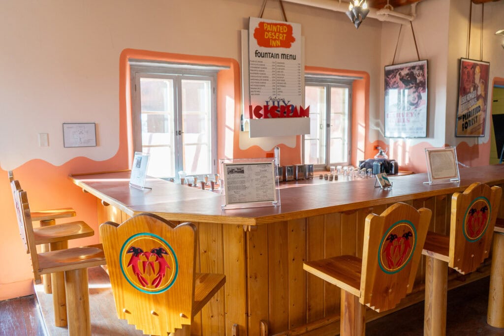 Painted Desert Inn Historic Building Retro Diner with Bar Stools, Counter, Movie Posters, and Pine